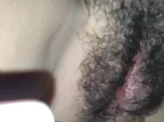 Shooting another load on her hairy pussy